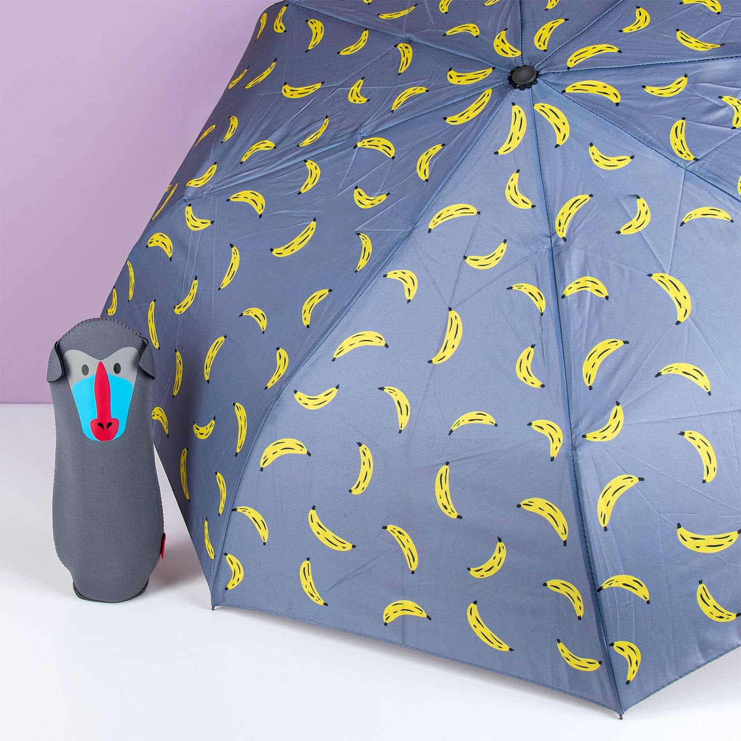 Regenschirm mit Tierhülle – Pavian