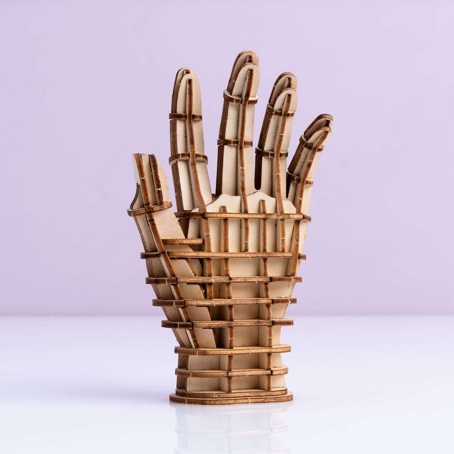 3D-Holzpuzzle – Hand