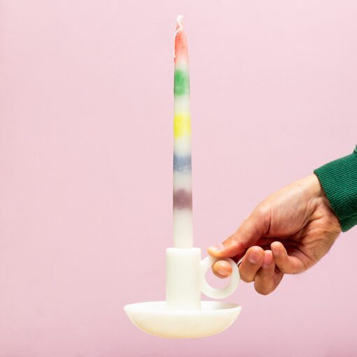Tropfende Regenbogens Kerze und Kerzenständer