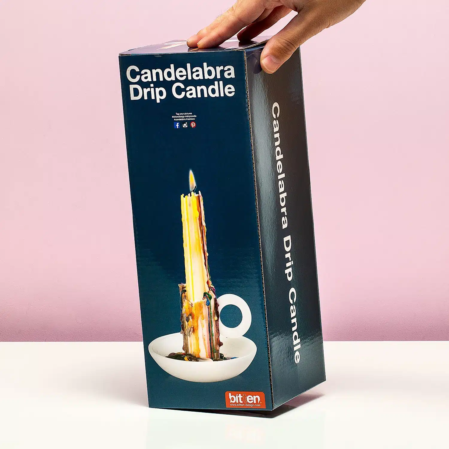 Tropfende Regenbogens Kerze und Kerzenständer