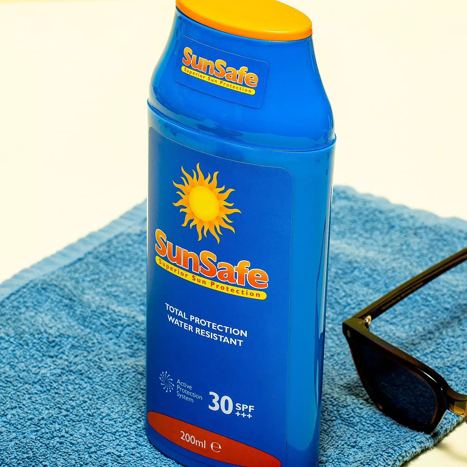 Sonnencreme-Flasche für Wertsachen