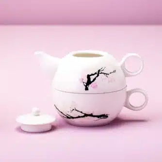 Wärmeempfindliche Blüten Teekanne und -tasse