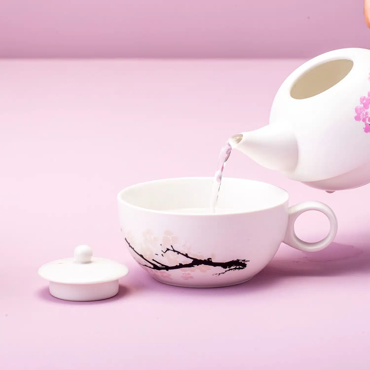 Wärmeempfindliche Blüten Teekanne und -tasse