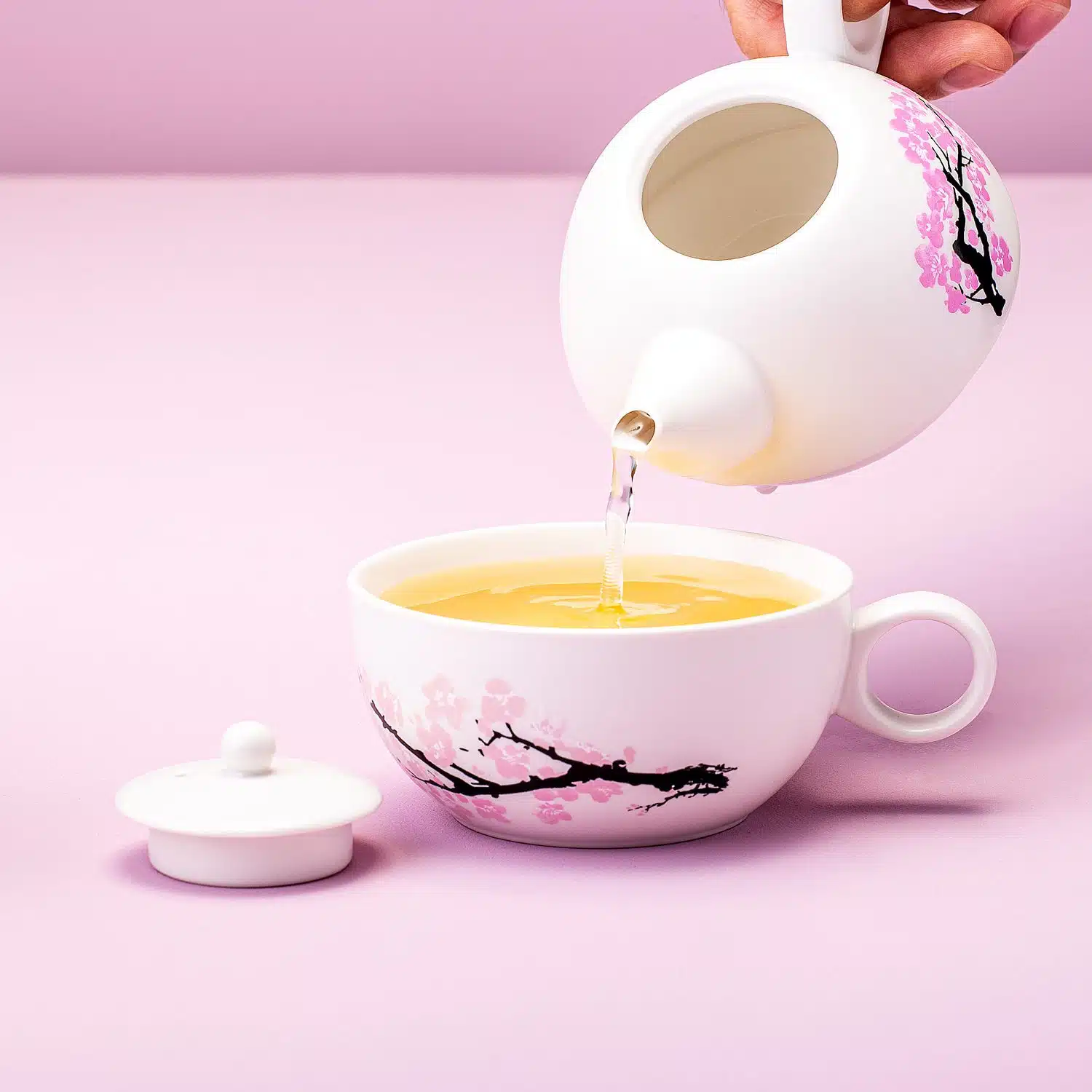 Wärmeempfindliche Blüten Teekanne und -tasse