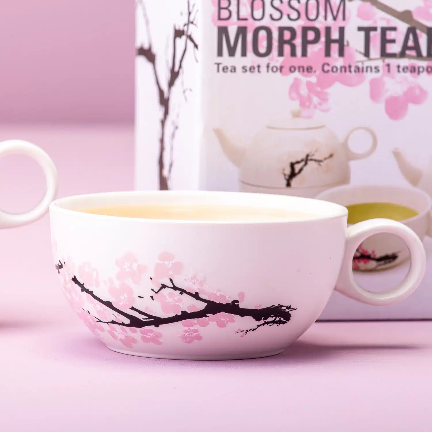 Wärmeempfindliche Blüten Teekanne und -tasse