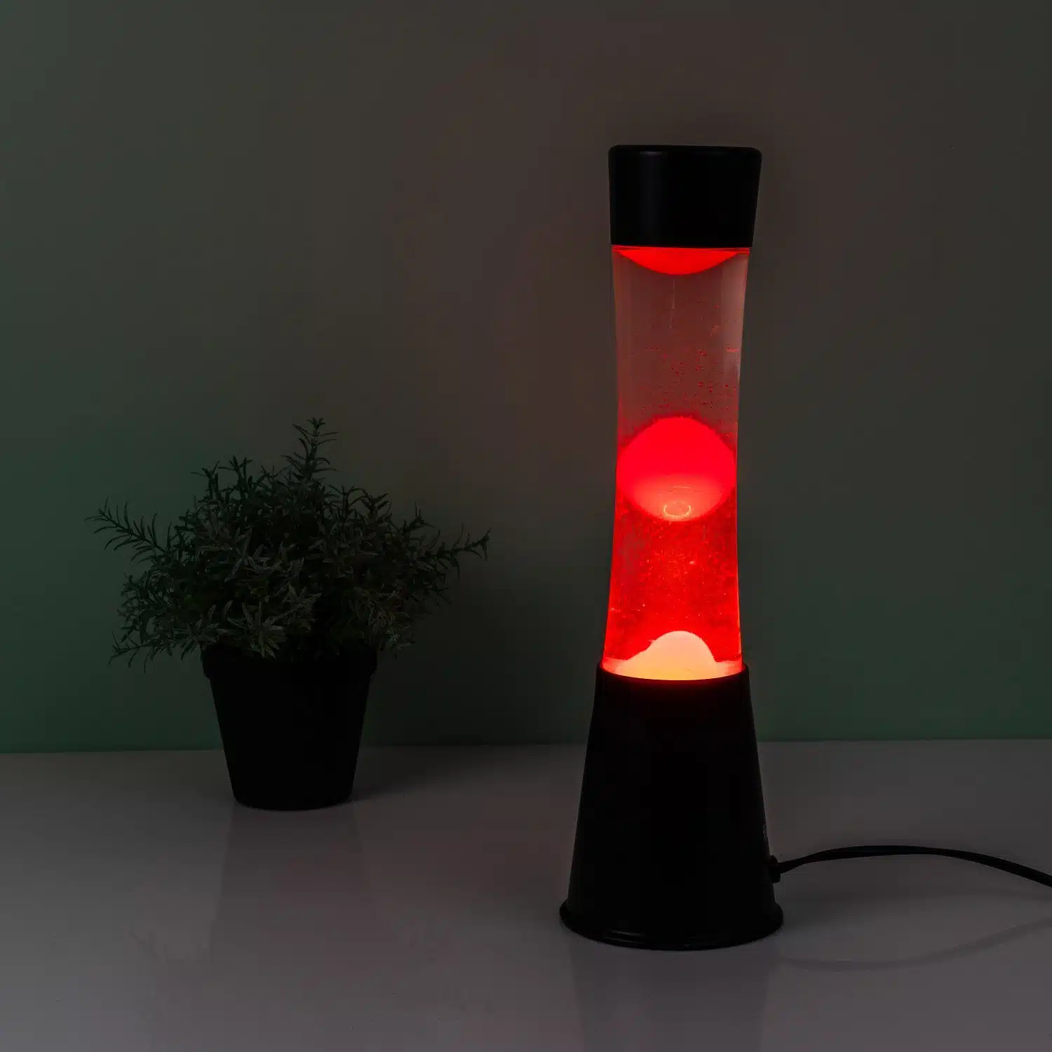 Lavalampe schwarz mit roter Lava