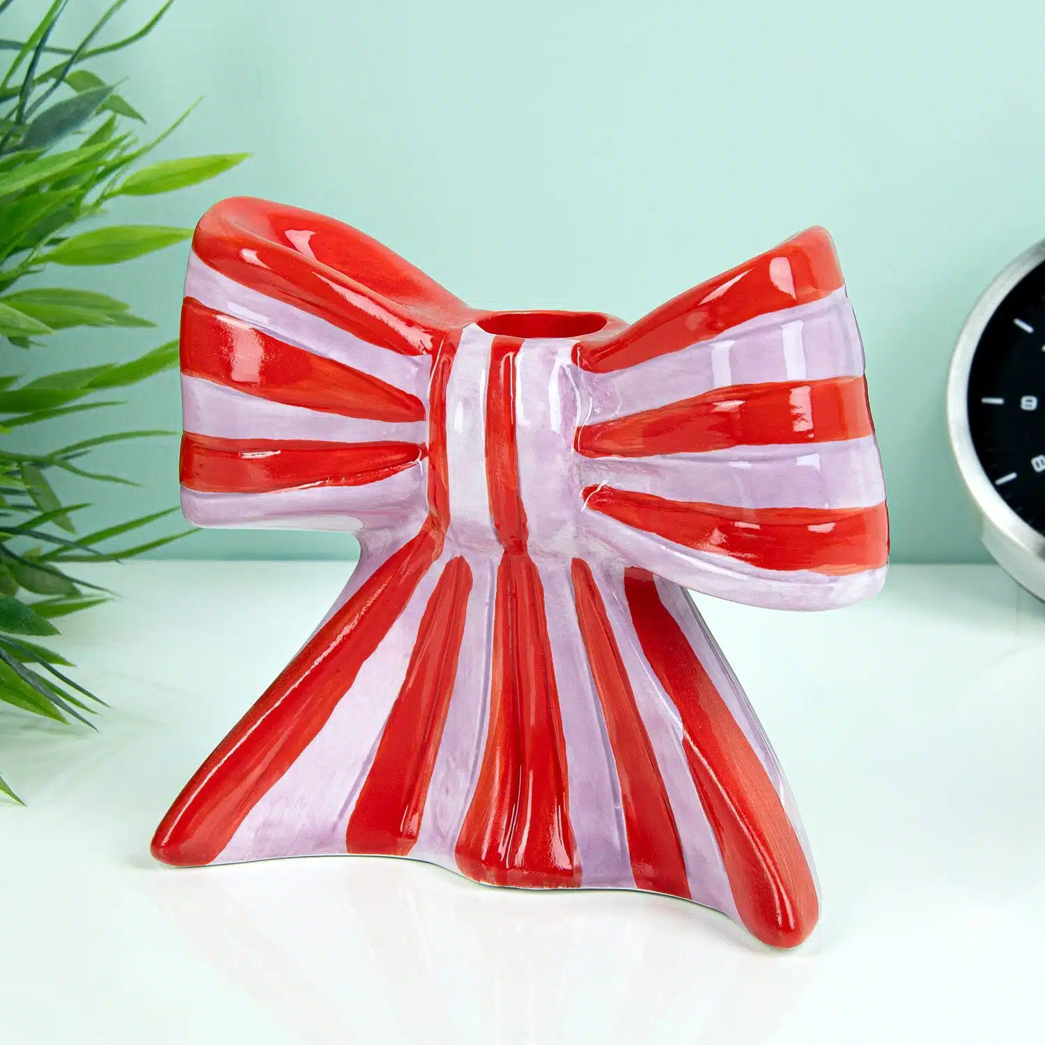 Schleifen-Kerzenhalter