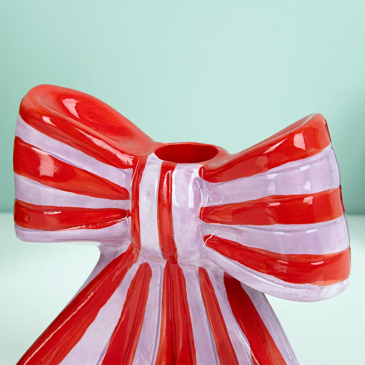 Schleifen-Kerzenhalter