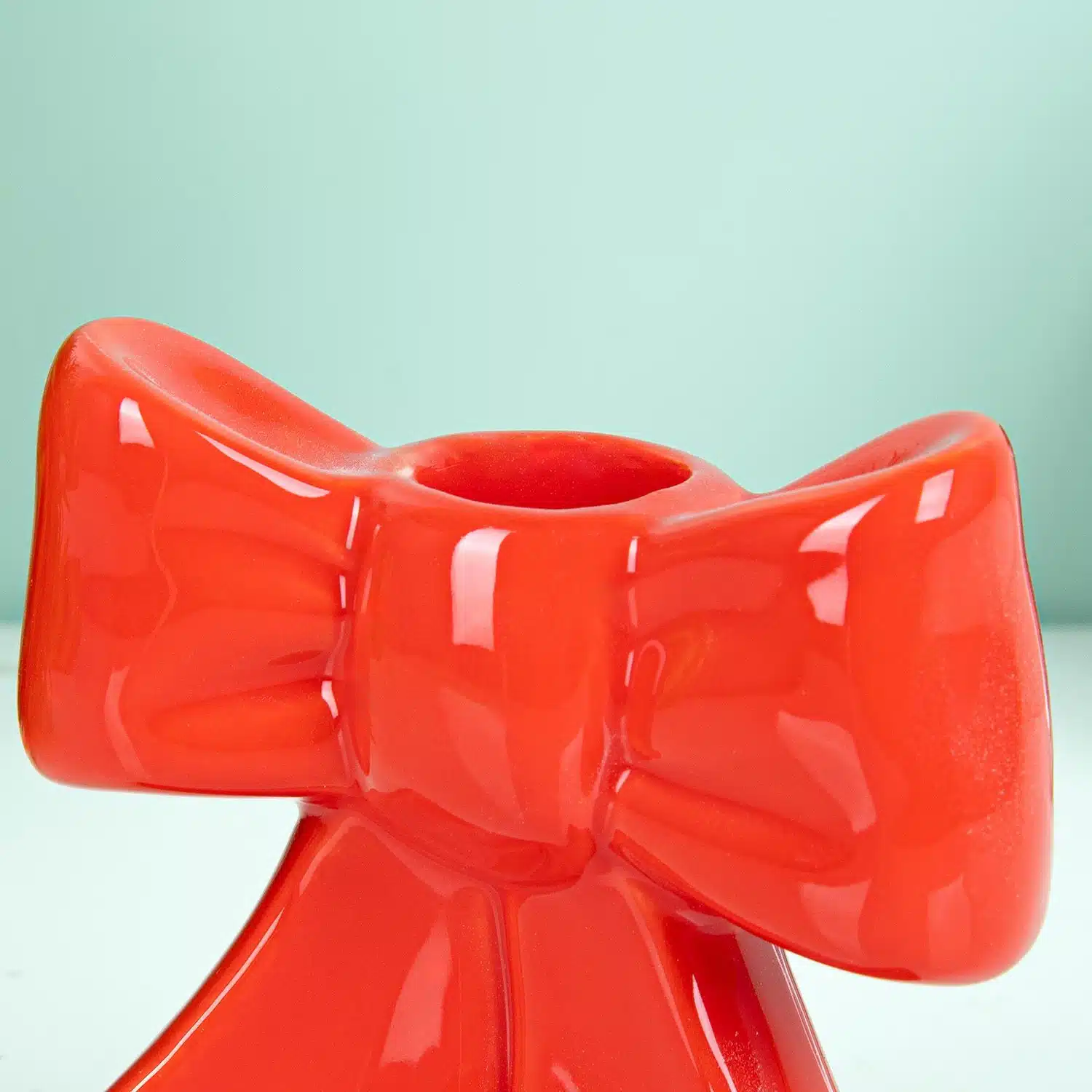 Schleifen-Kerzenhalter