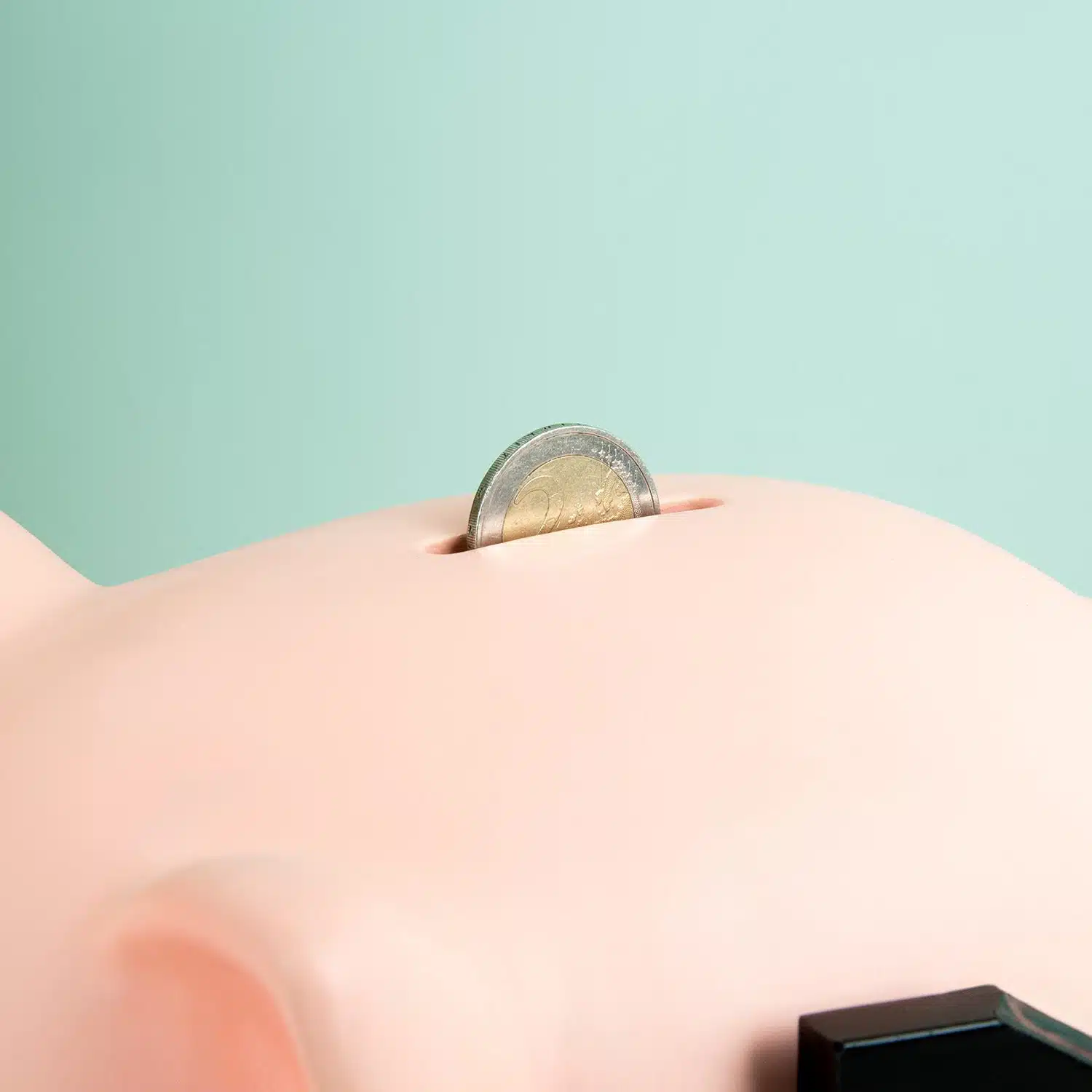 Sparschwein mit Hammer