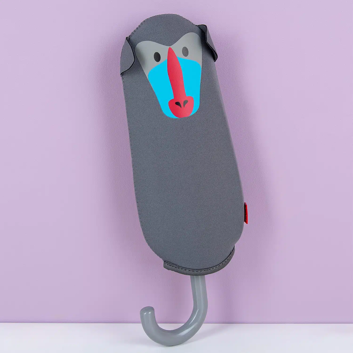 Regenschirm mit Tierhülle