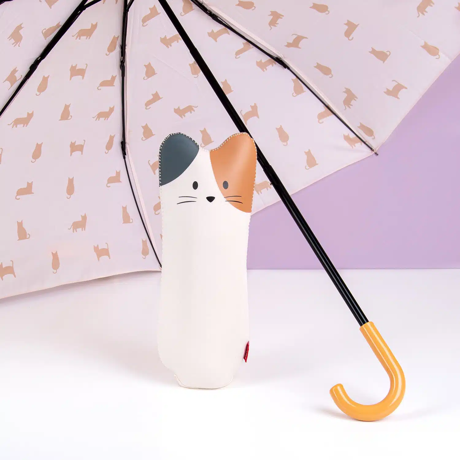 Regenschirm mit Tierhülle