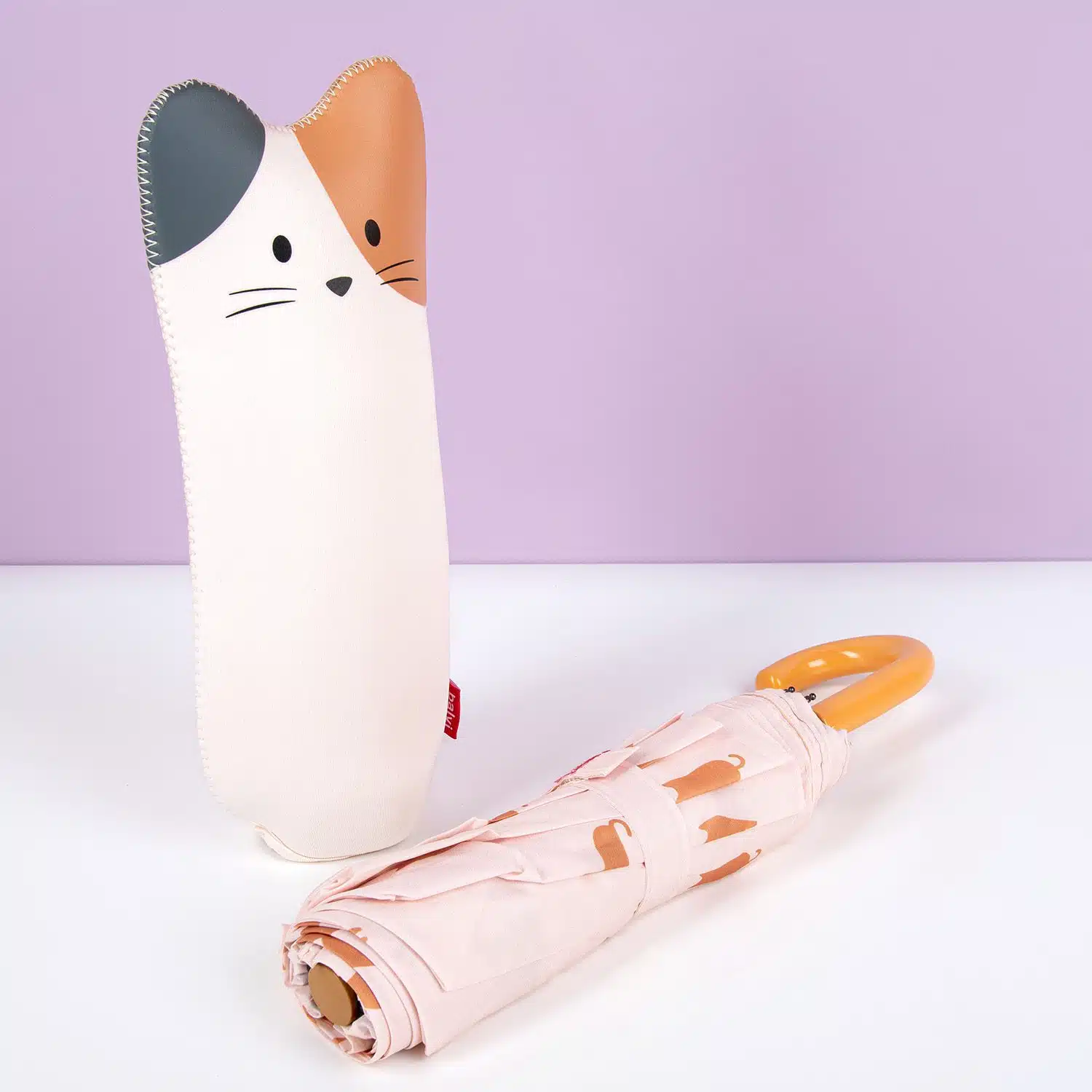 Regenschirm mit Tierhülle