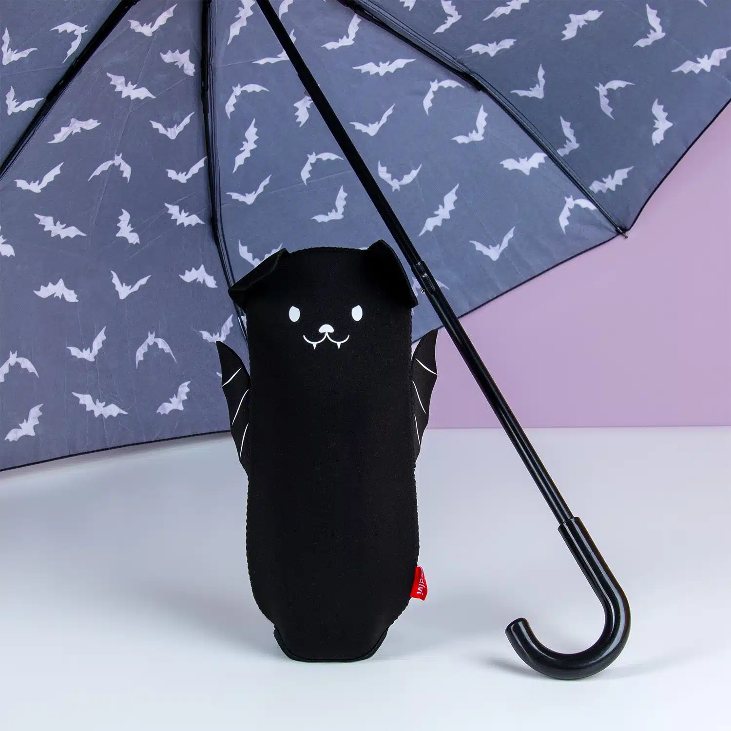 Regenschirm mit Tierhülle