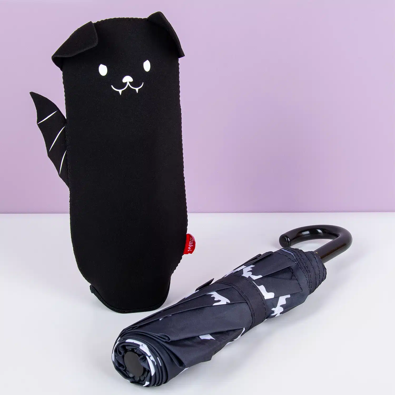 Regenschirm mit Tierhülle