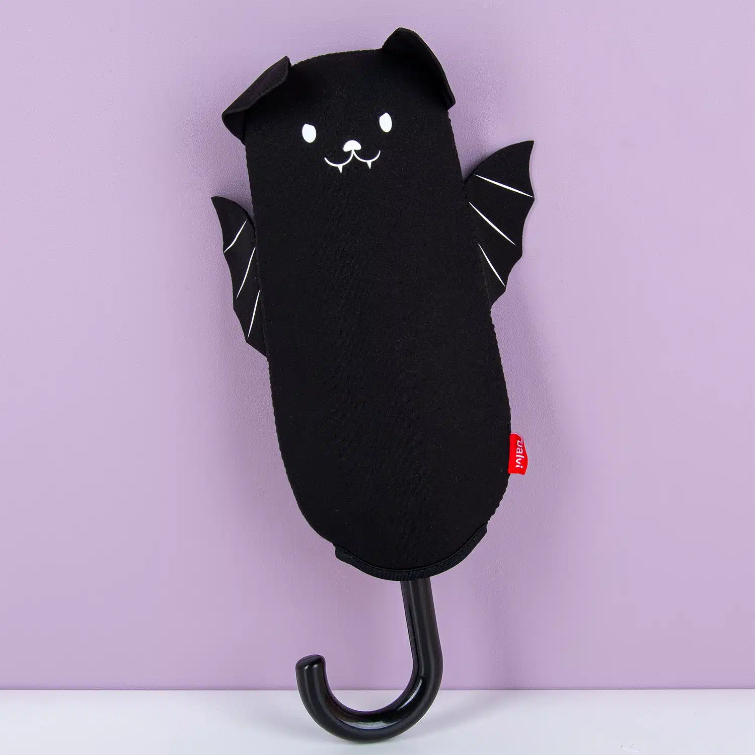 Regenschirm mit Tierhülle