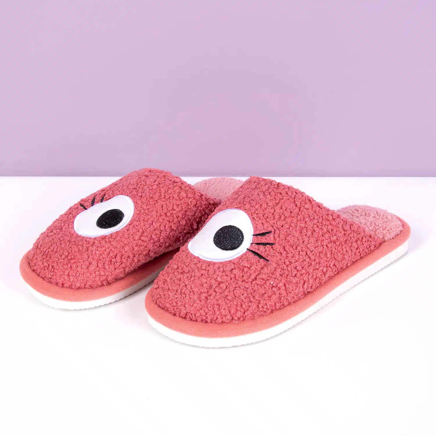 Rosa Hausschuhe mit Augen