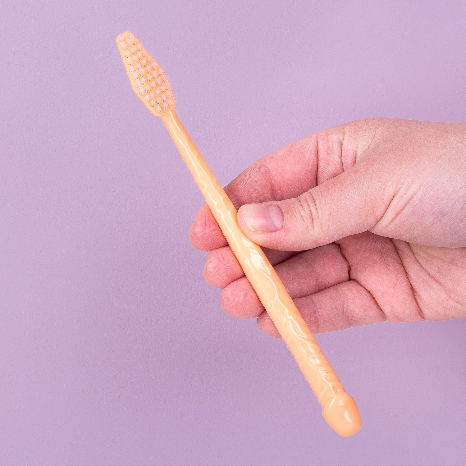 Toothbrush, Penis-Met hand